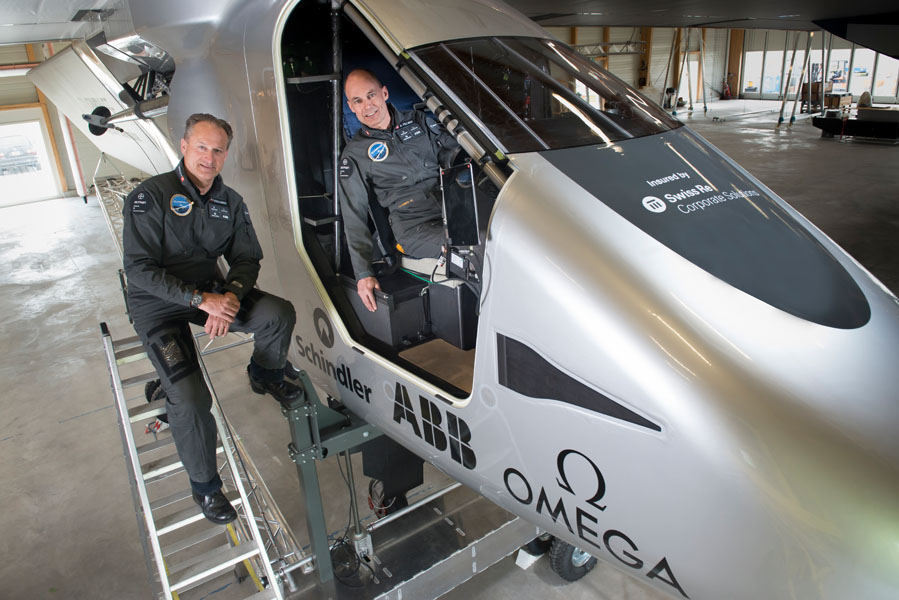 (From left to right) AndrÈ Borschberg, Co-founder and CEO and Bertrand Piccard, Initiator and Chairman beside the cockpit of Solar Impulse 2.