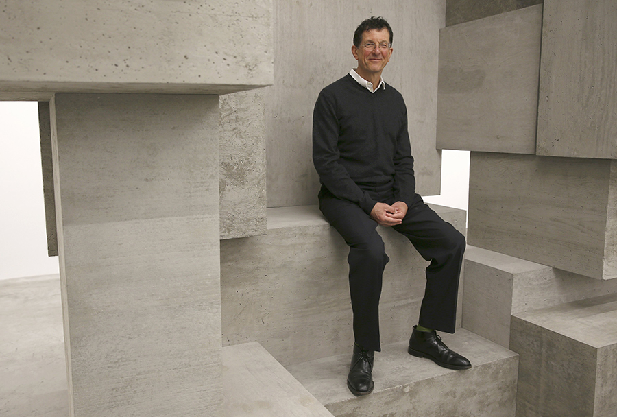 Artist Antony Gormley poses for a photograph with one of his pieces called "Block", forming part of an exhibition entitled "Fit", at the White Cube gallery in London, Britain September 29, 2016. REUTERS/Peter Nicholls